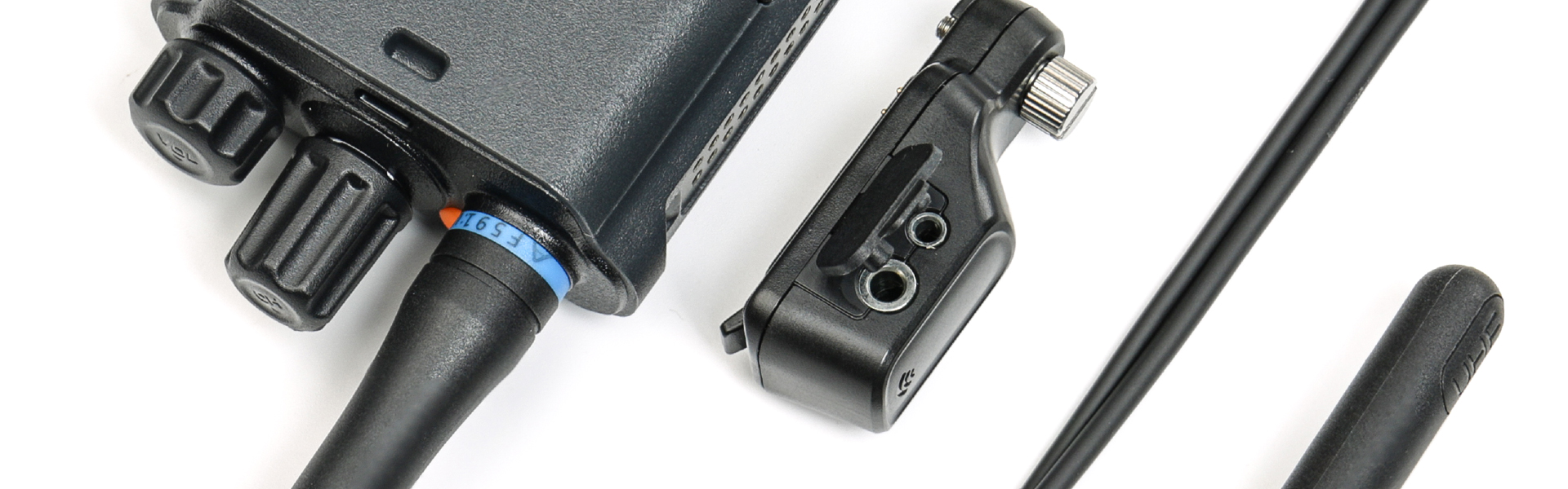 Two-way radio audio adapter for connecting communication accessories across different radio systems.