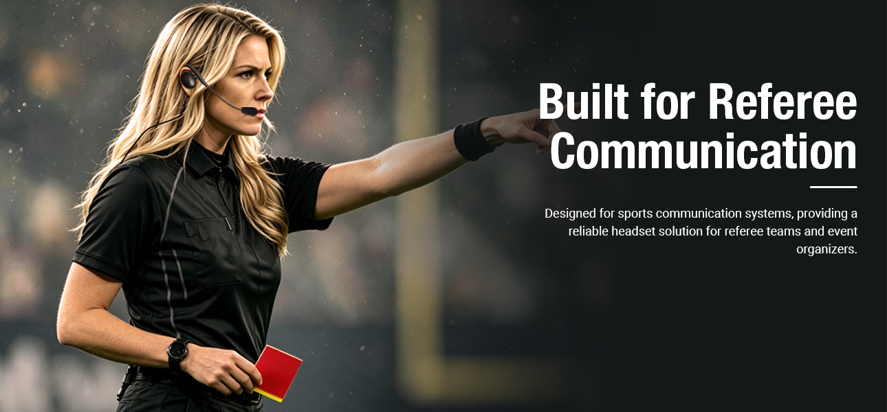 Female soccer referee using communication headset while making a call at professional tournaments