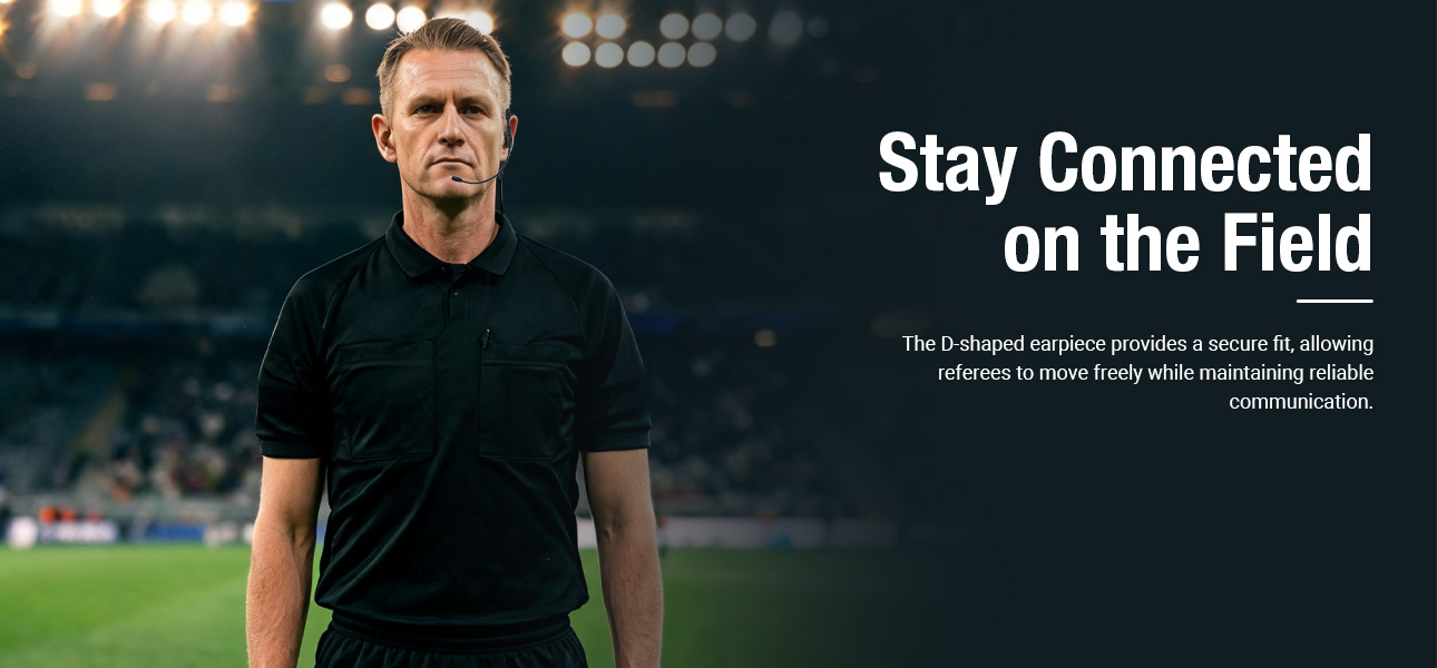 Football referee using a G Shape earpiece for secure fit and reliable communication during matches