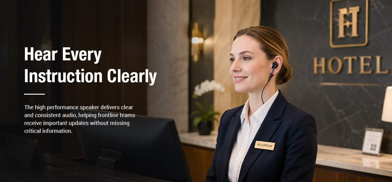 Hotel reception staff wearing receive only earphones to hear guest service instructions clearly