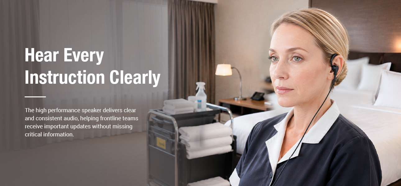 Housekeeping staff hearing hotel manager instructions through receive only earpieces before room cleaning