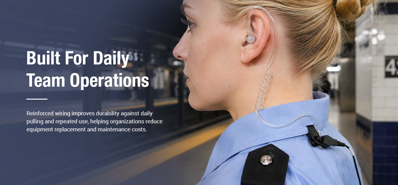 Transit security team wearing receive-only earpieces with reinforced wiring during daily patrols