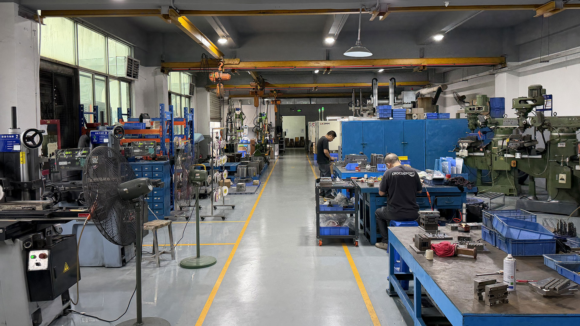 two way radio Communication-Engineer-Adjusting-Molds-and-Production-Equipment-at-RayTalk’s-Production-and-R&D-Center